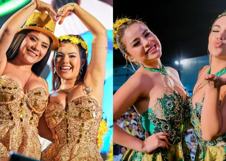 Integrantes de Son del Duke y La Bella Luz posan sobre el escenario durante un concierto, luciendo trajes brillantes en tonos dorados y verdes, con luces del show y público al fondo