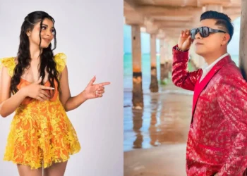 Dos artistas posando en imágenes separadas: a la izquierda, una mujer con vestido corto amarillo señalando hacia un lado sobre fondo blanco; a la derecha, un hombre con saco rojo brillante y gafas de sol posando bajo un muelle junto al mar.