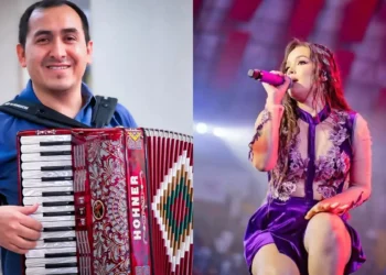 Edwin Guerrero Neira tocando el acordeón y Kiara Lozano cantando en vivo en un concierto de la agrupación de cumbia Corazón Serrano.
