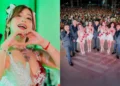Anely Dávila hace un gesto de corazón junto a los integrantes de La Bella Luz en concierto.