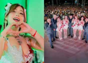 Anely Dávila hace un gesto de corazón junto a los integrantes de La Bella Luz en concierto.